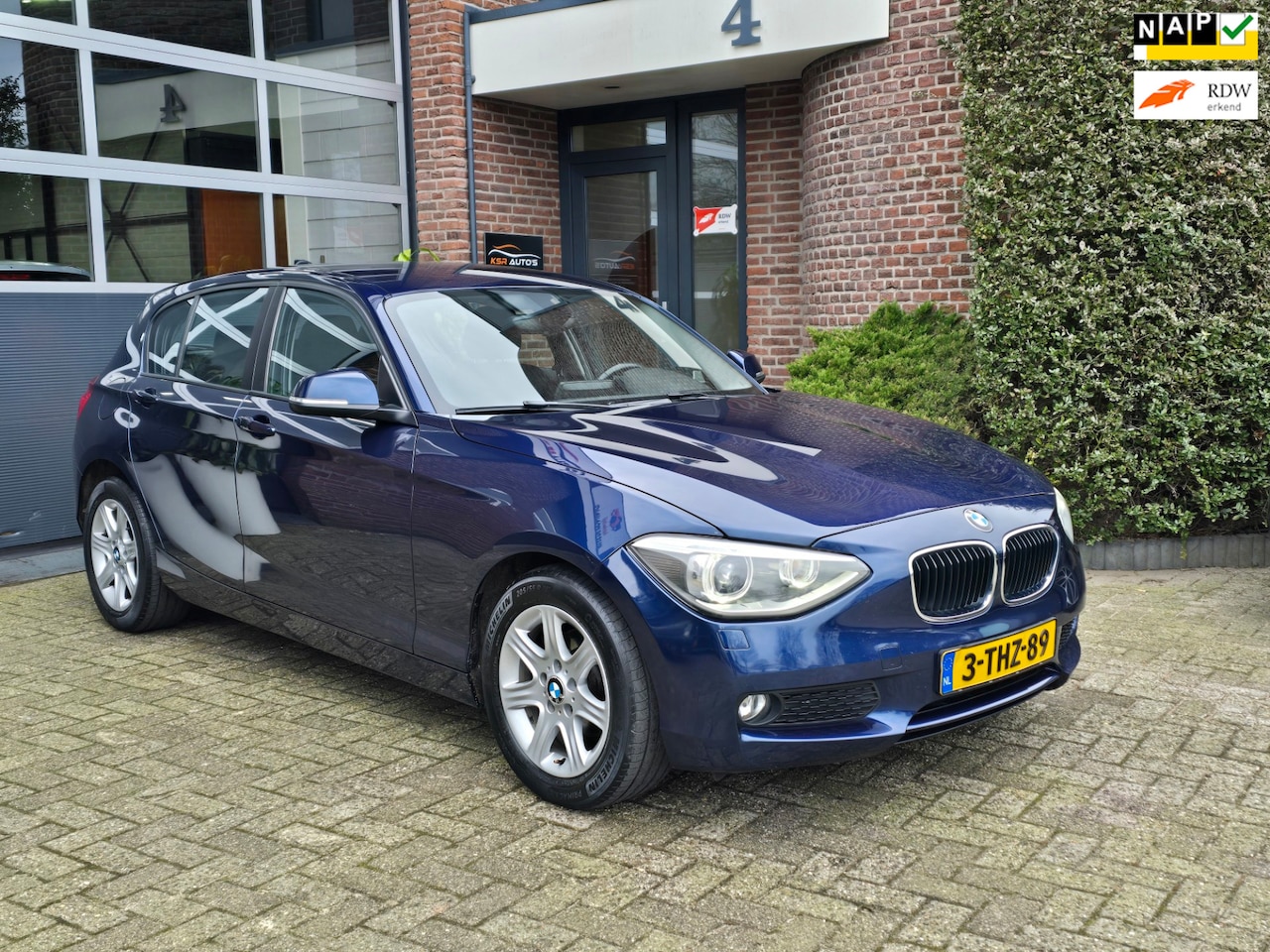 BMW 1-serie - 116i Executive Automaat |Nap |Keyless |Clima - AutoWereld.nl