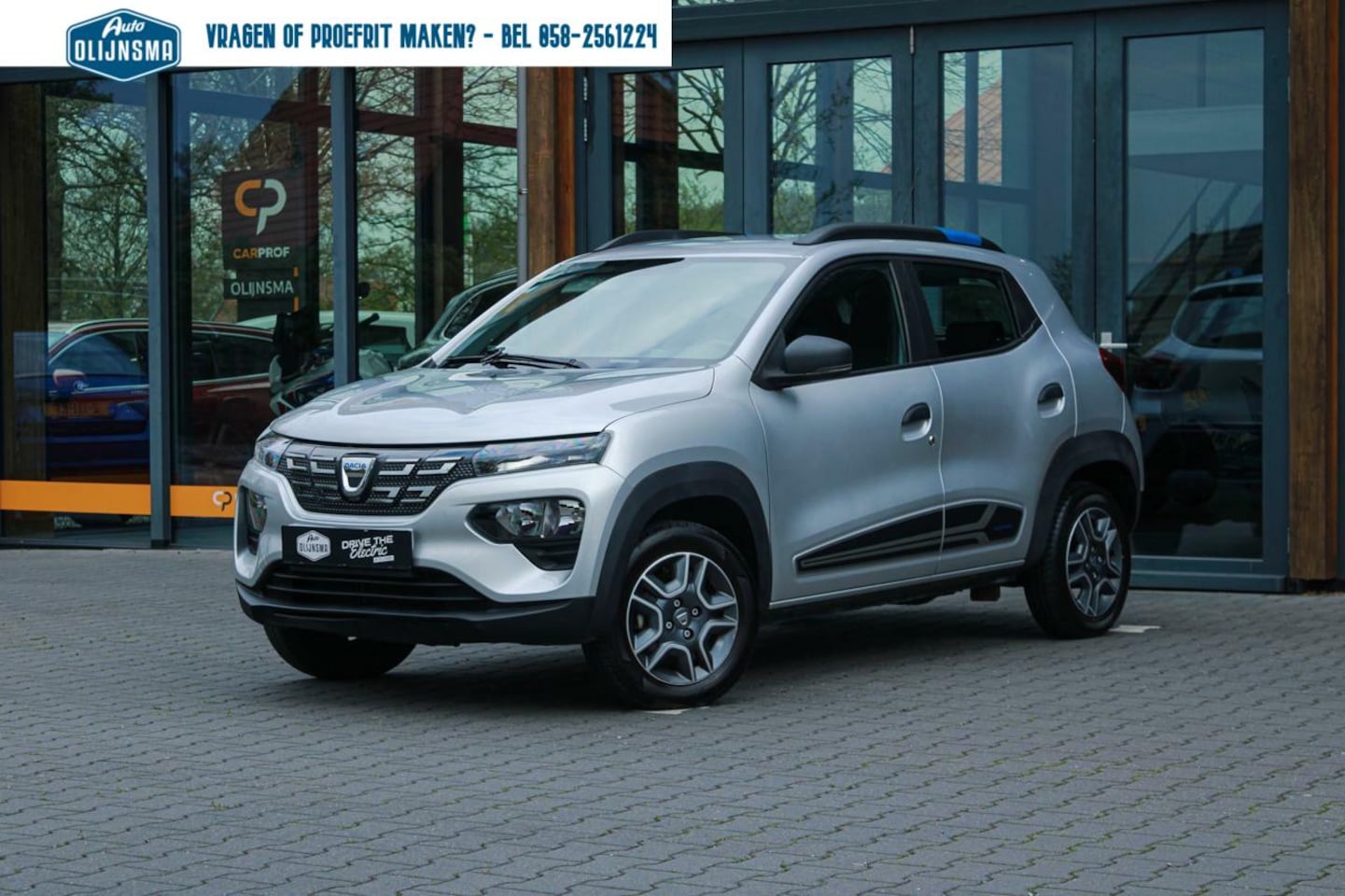 Dacia Spring - Comfort Plus 27 kWh|CCS|Navi|Camera|Leer|Airco - AutoWereld.nl