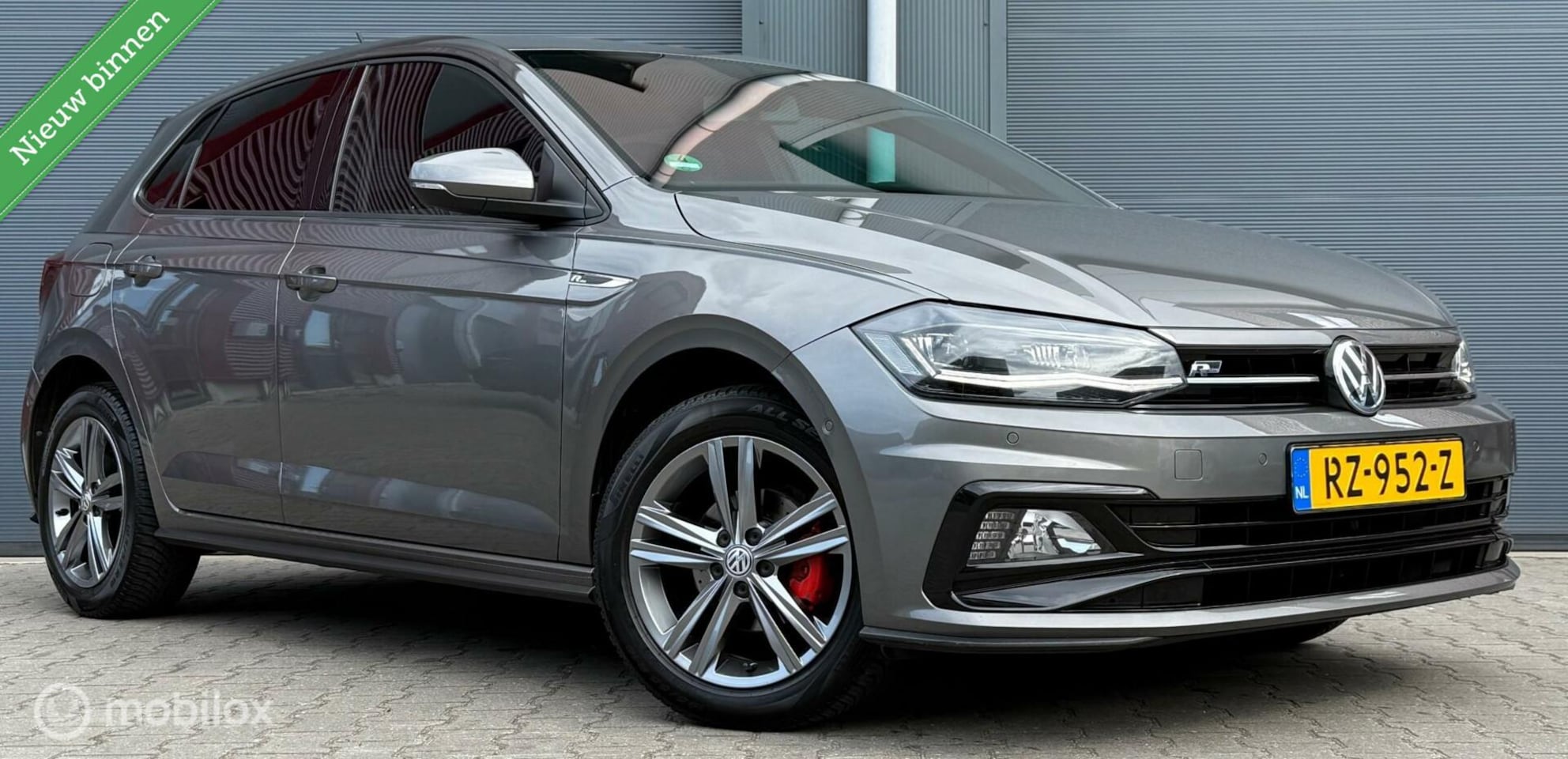 Volkswagen Polo - 1.0 TSI Highline 2X R-line Clima/Carplay/Navi - AutoWereld.nl