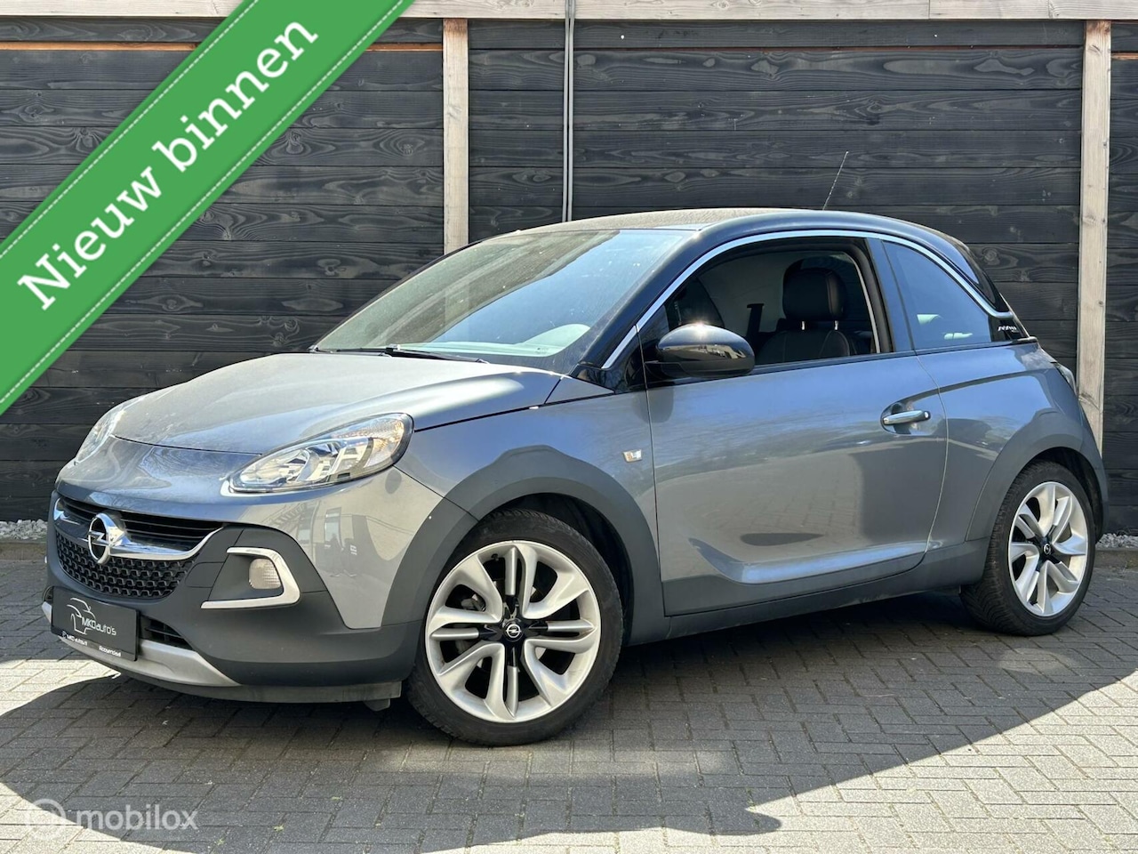 Opel ADAM - 1.2i Rocks uitvoering / half leder / airco / 17" LM / 79.989 KM!! - AutoWereld.nl