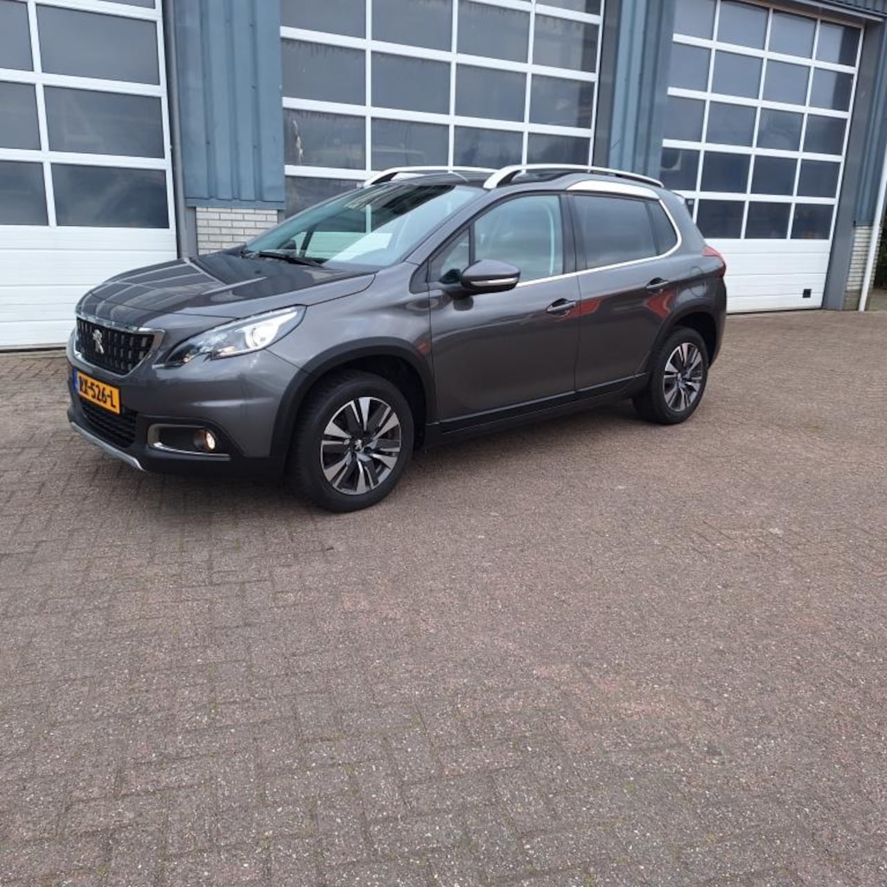 Peugeot 2008 - 1.2 PureTech Allure Automaat - AutoWereld.nl