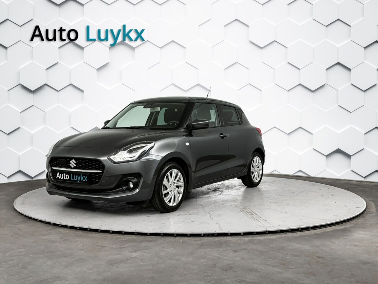 Suzuki Swift - 1.2 Select Smart Hybrid | Navigatie | Adaptieve Cruise Control | 16'' L.M. velgen - AutoWereld.nl