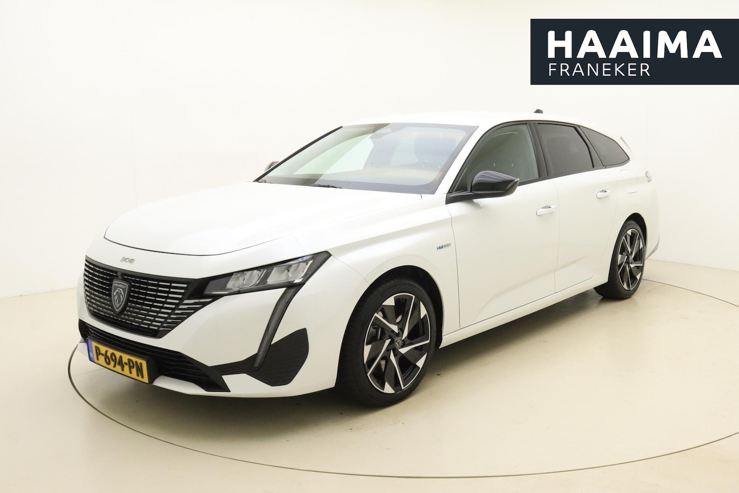 Peugeot 308 SW - 1.6 HYbrid 180 Allure Pack Business | Navigatie | Camera | Stoelverwarming | Verwarmde voo - AutoWereld.nl
