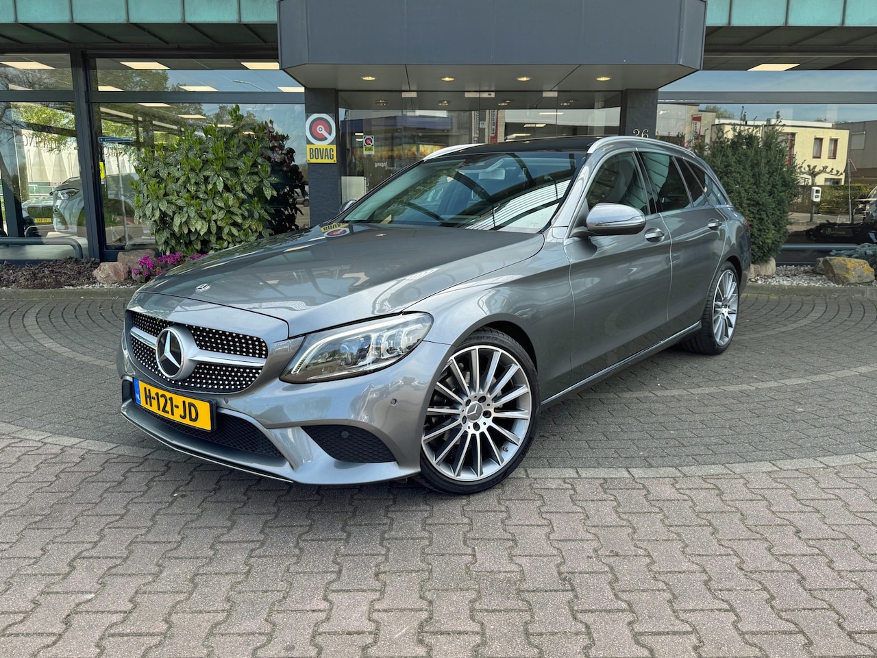 Mercedes-Benz C-klasse Estate - 180 Panoramadak Multibeam 19 inch AMG Camera Sfeerverlichting Stoelverwarming Spiegelpakke - AutoWereld.nl