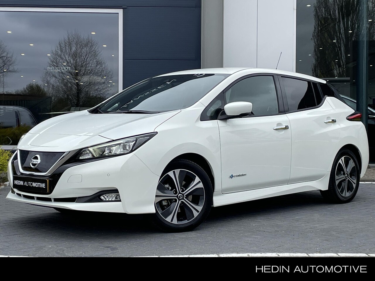 Nissan LEAF - Tekna 40 kWh | Half Leder | BOSE | Clima | Navi - AutoWereld.nl