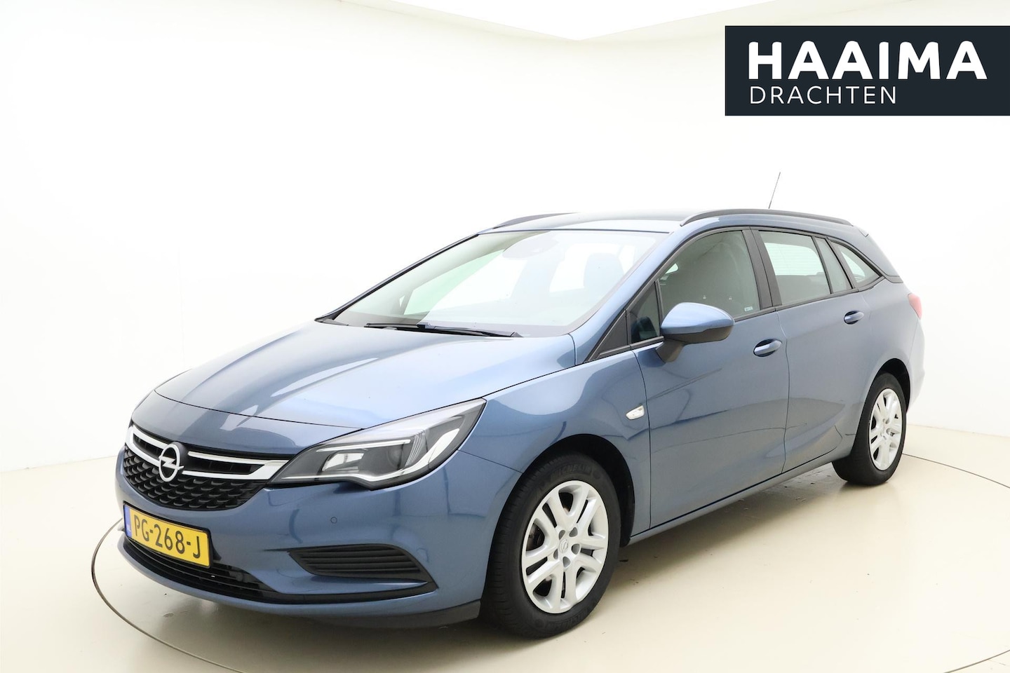 Opel Astra Sports Tourer - 1.0 Online Edition | Airco | Cruise Control | Parkeersensoren achter | Lane Assist | 1e Ei - AutoWereld.nl