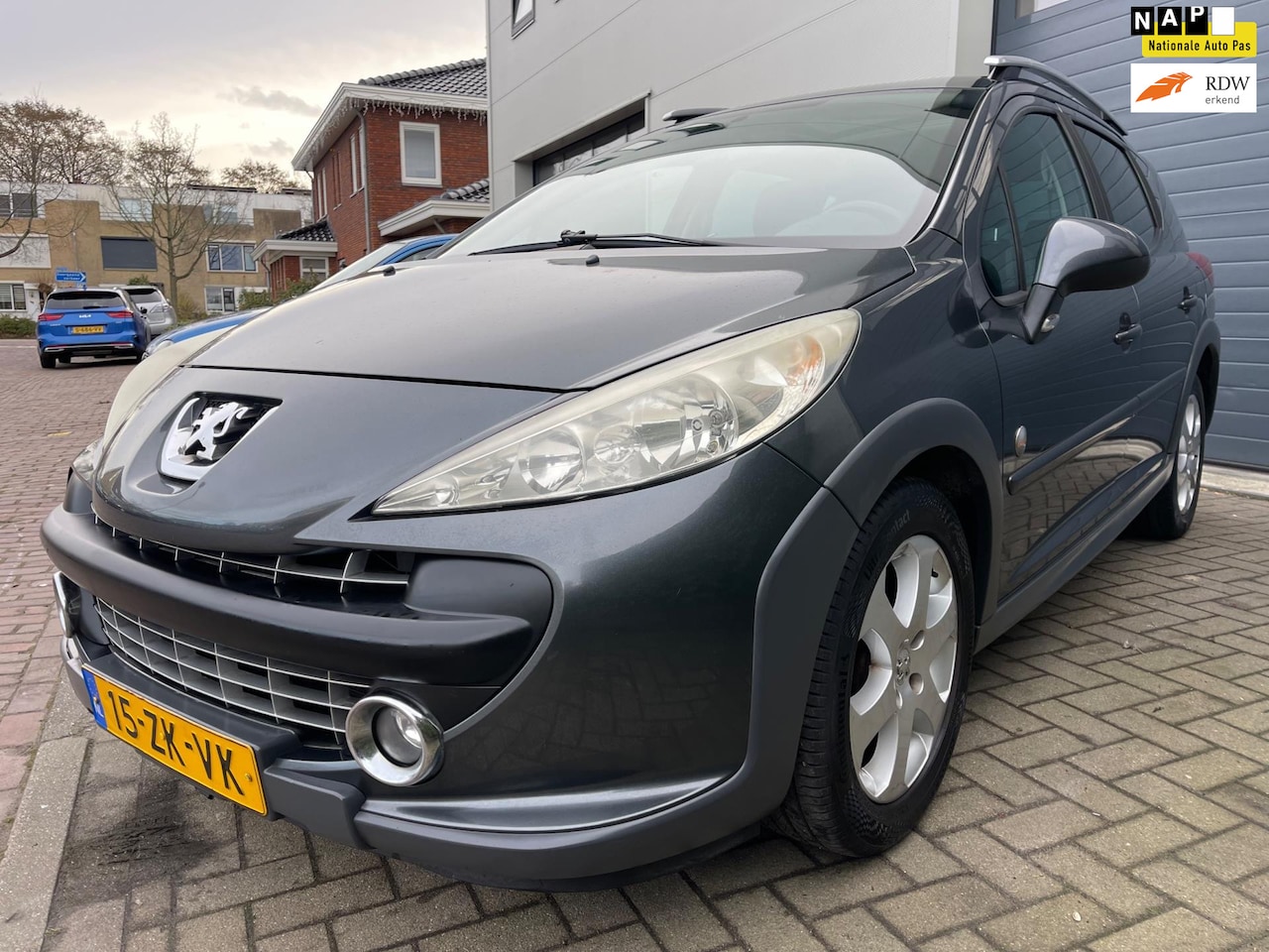 Peugeot 207 SW Outdoor - 1.6 VTi XS/Airco/Panorama dak/Cruise-c/Leder - AutoWereld.nl
