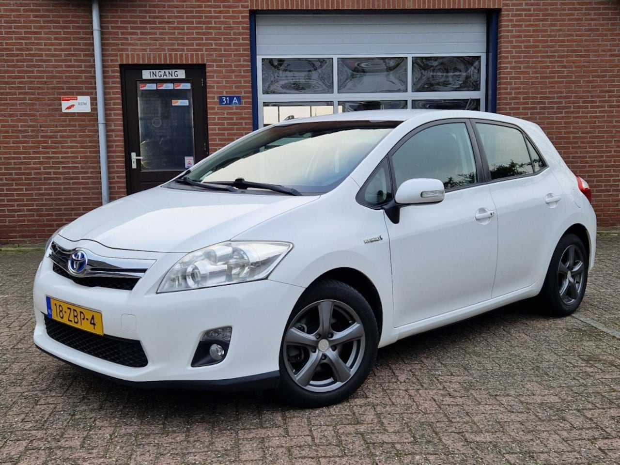 Toyota Auris - 1.8 Full Hybrid Executive Business NL-auto Clima Navi Camera - AutoWereld.nl