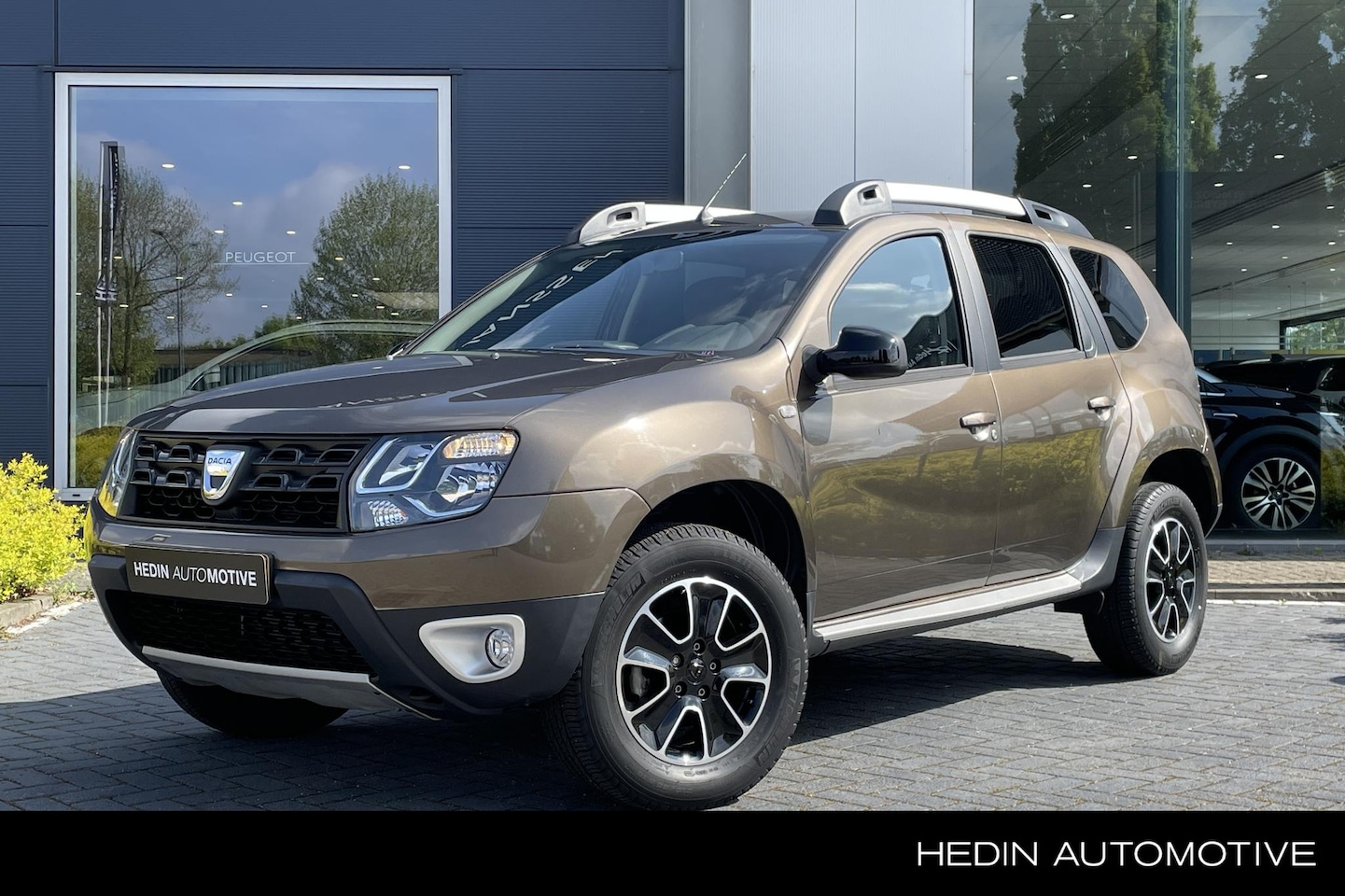 Dacia Duster - 1.2 TCe 4x2 Blackshadow | Leder | Camera | Navigatie | Cruise Control | Climate Control | - AutoWereld.nl