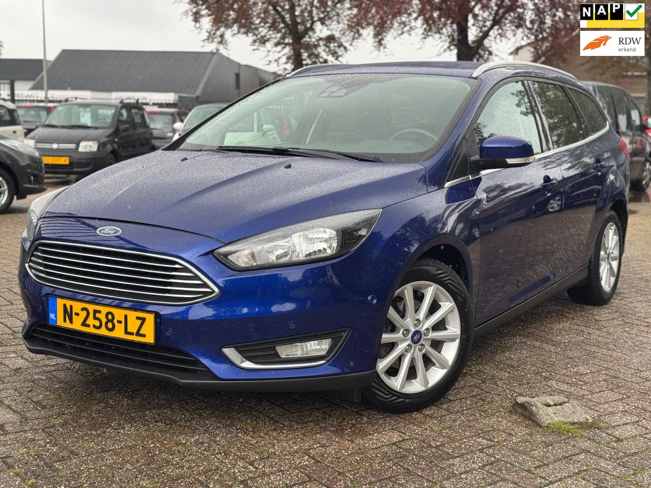 Ford Focus Wagon - 1.0 Titanium AUTOMAAT NAVI STUUR/STOELVERW. NWE D.RIEM 125 PK - AutoWereld.nl