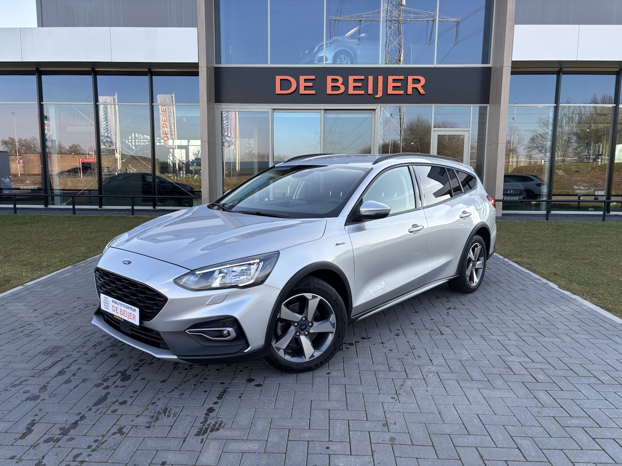 Ford Focus Wagon - 1.0 EcoBoost Active 125pk Automaat I Cruise I Navigatie - AutoWereld.nl