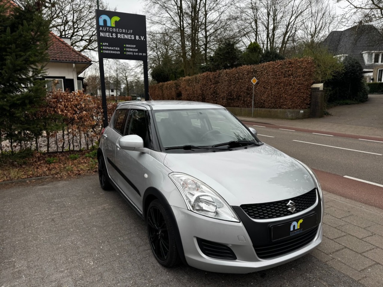 Suzuki Swift - 1.2/SPORT/NAP/TREKHAAK/BLUETOOTH/AIRCO/APK/GARANTIE - AutoWereld.nl
