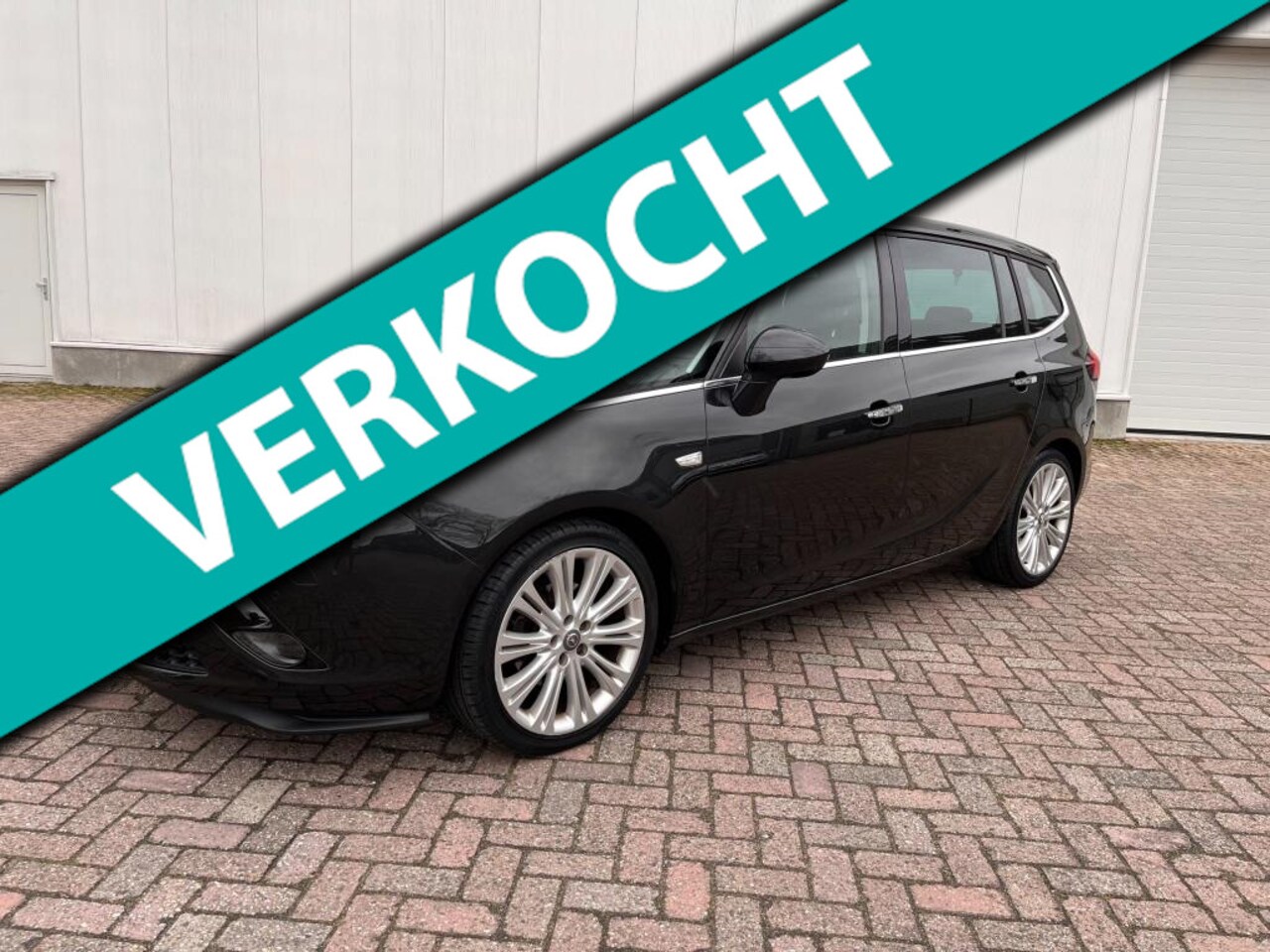 Opel Zafira Tourer - 1.4 Cosmo Navigatie+trekhaak+panorama dak ECC 2012 - AutoWereld.nl