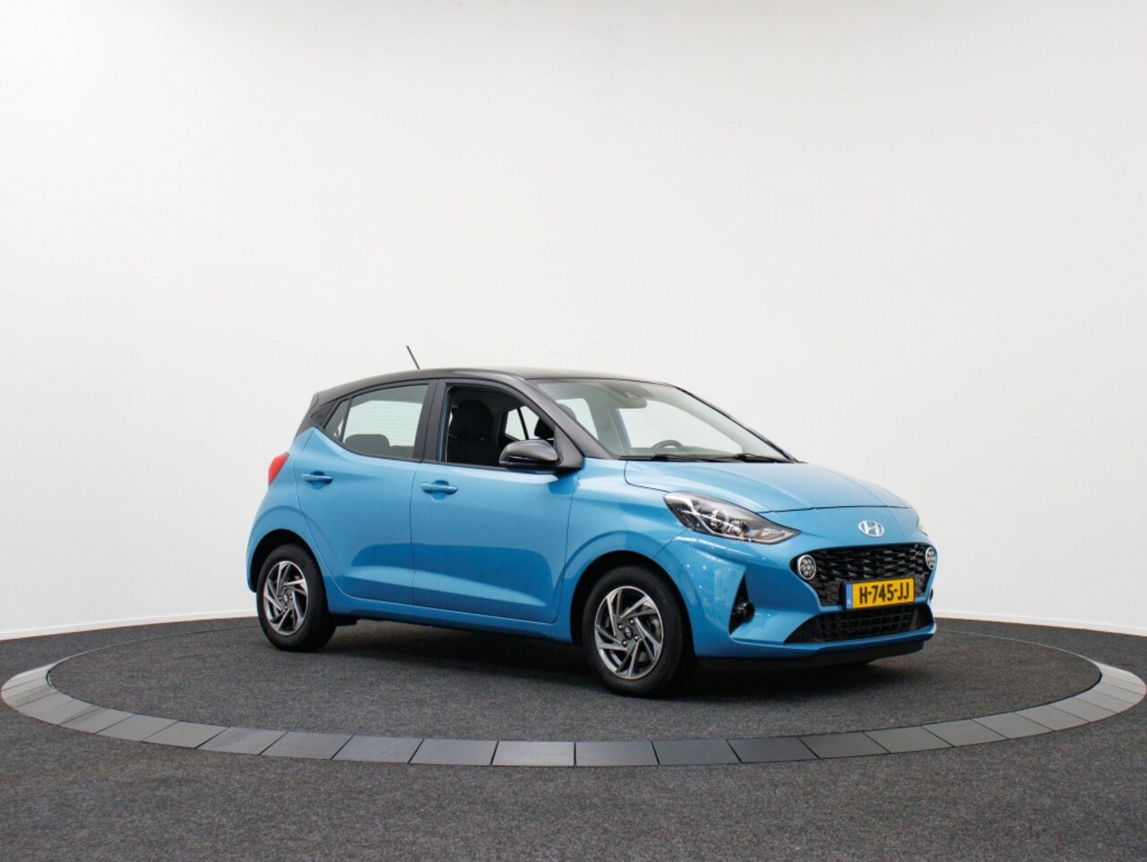 Hyundai i10 - 1.0 Premium | 14" | Zwart dak | Climate control - AutoWereld.nl