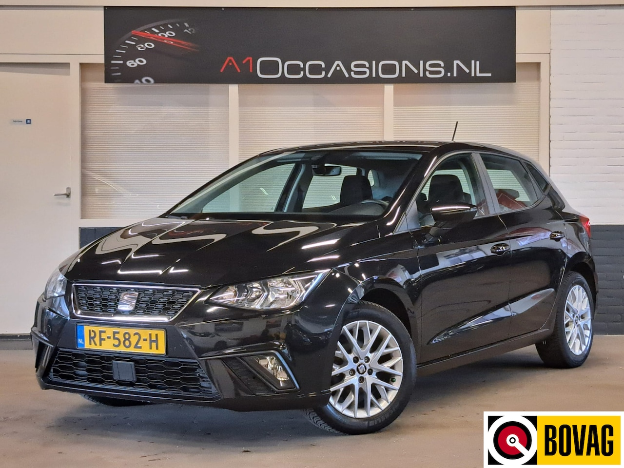Seat Ibiza - 1.0 TSI Style + NAVI !! - AutoWereld.nl