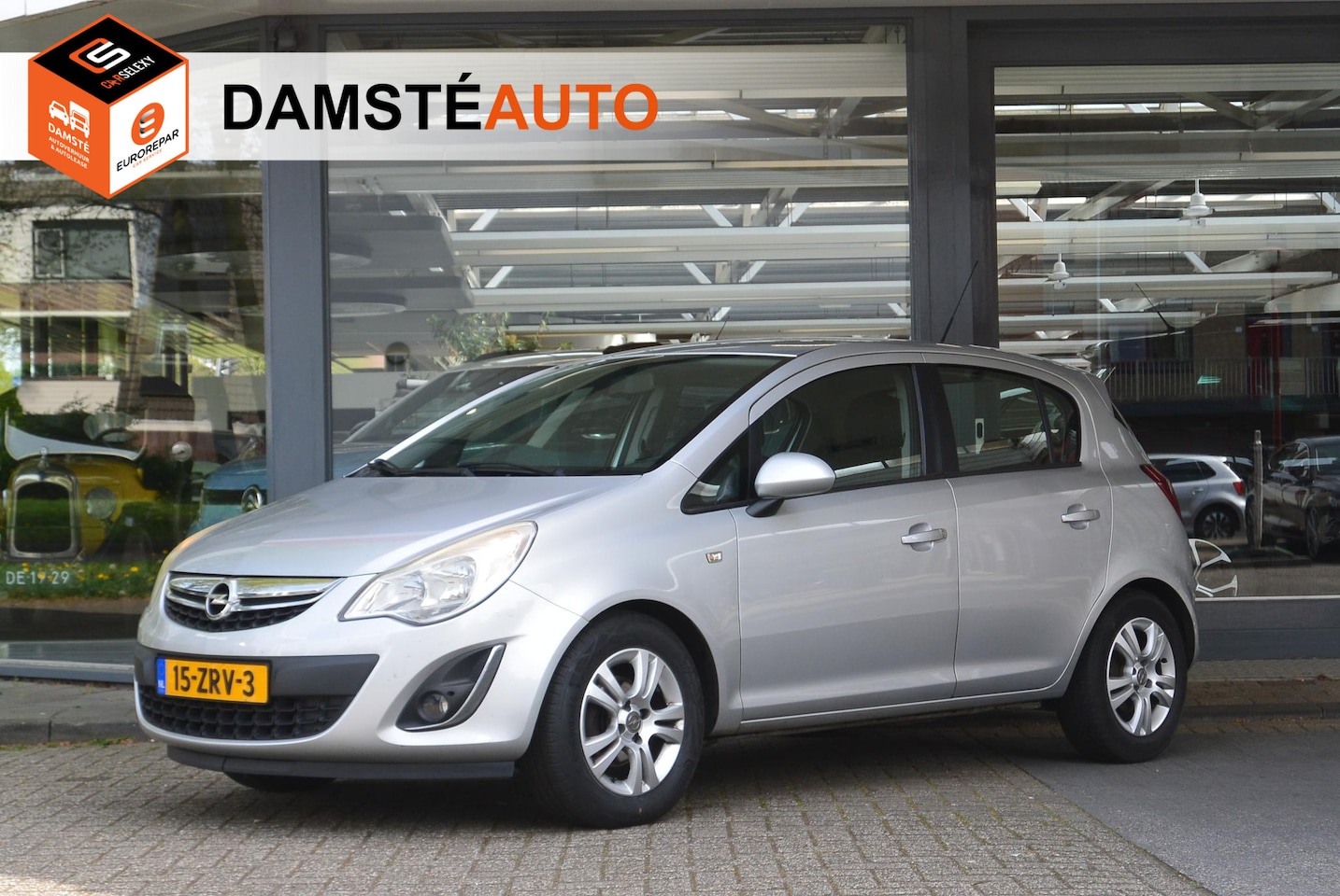 Opel Corsa - 1.2-16V 85pk Rhythm │ Airconditioning │ Cruise control │ Lichtmetalen velgen - AutoWereld.nl