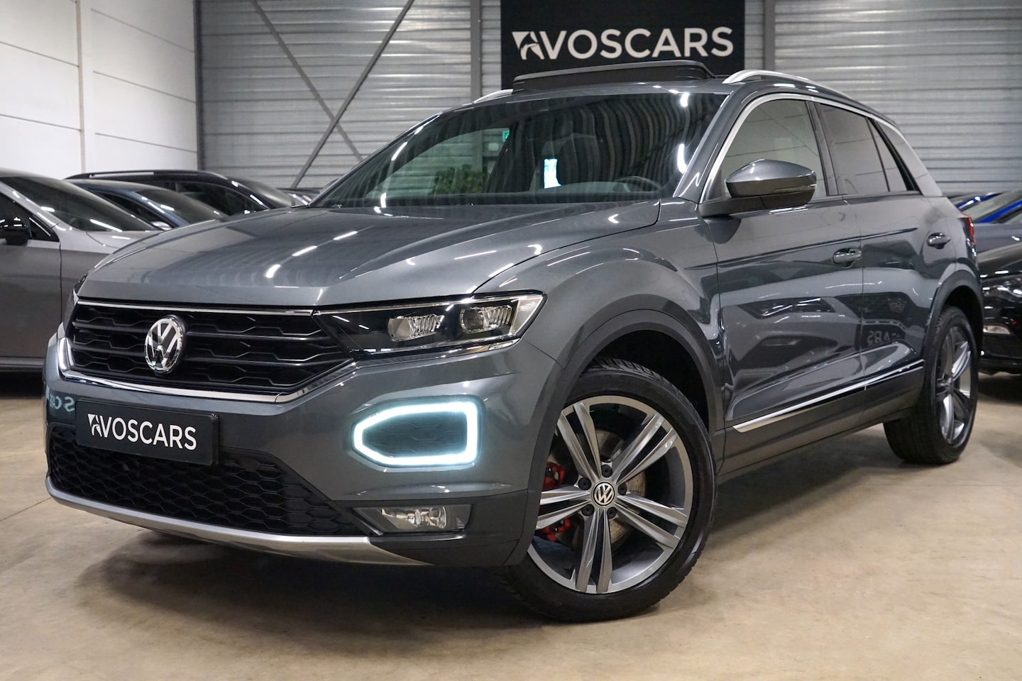 Volkswagen T-Roc - 1.5 TSI Sport DSG * Pano - Trekhaak - Virtual - LED - 18" - Camera - ACC - App * - AutoWereld.nl