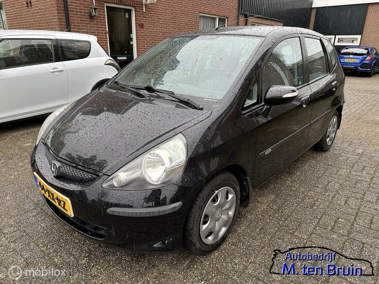 Honda Jazz - 1.4 LS Airco + parkeersensoren - AutoWereld.nl