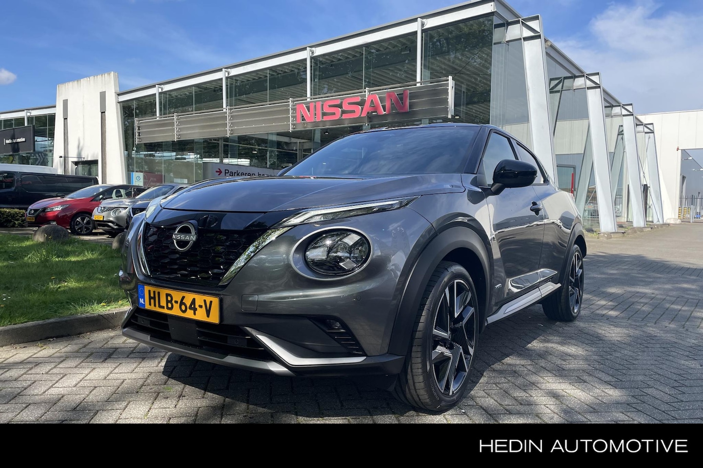 Nissan Juke - 1.6 Hybrid N-Design 19"| Cruise ctrl |Climate ctrl | Achteruitrijcamera | Keyless entry - AutoWereld.nl
