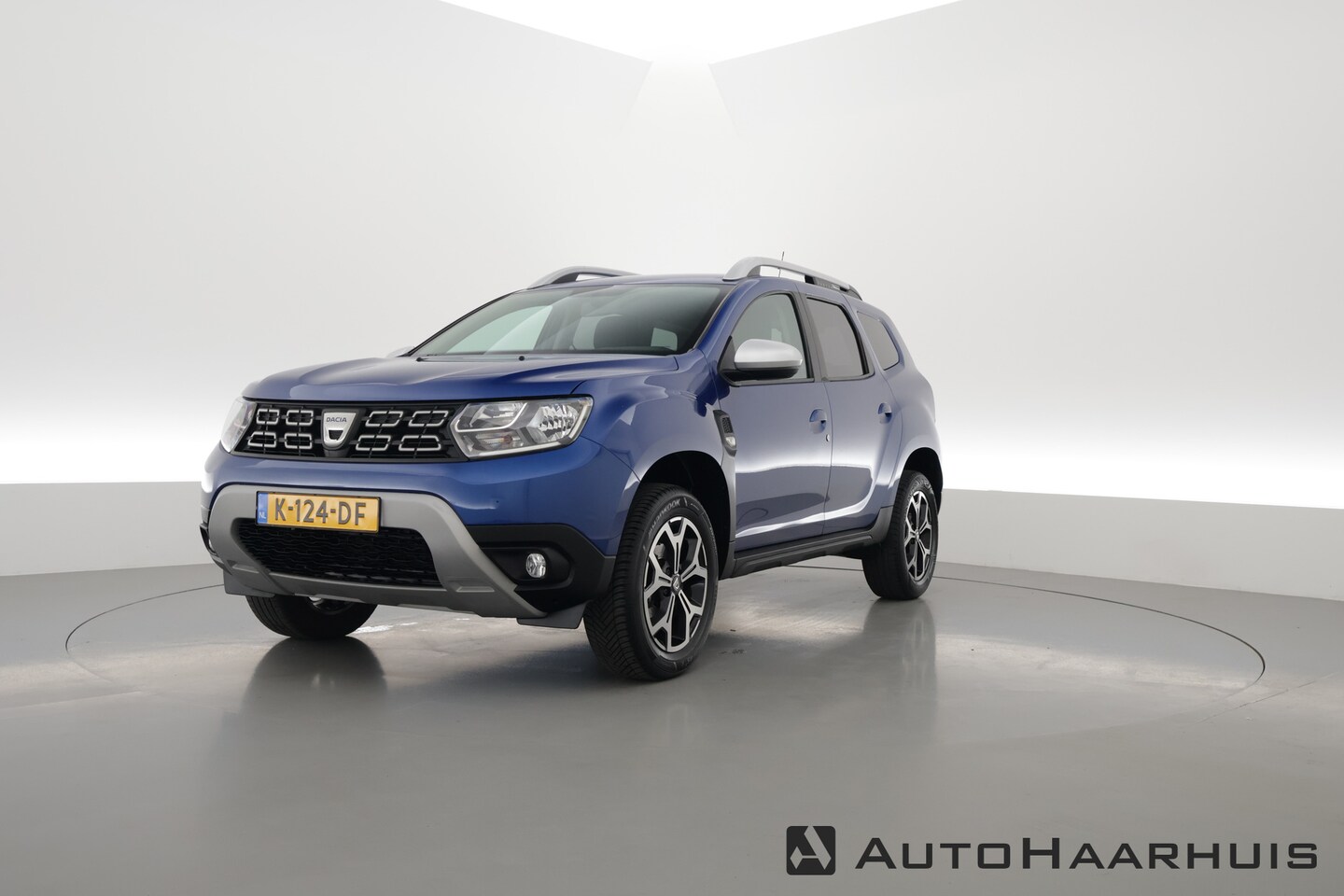 Dacia Duster - 1.0 TCe Bi-Fuel Prestige | Navi | Cruise. | Achteruitrijcamera | DAB - AutoWereld.nl