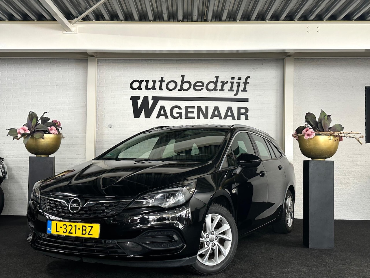 Opel Astra Sports Tourer - 1.2 Business Elegance 131pk Trekhaak - AutoWereld.nl