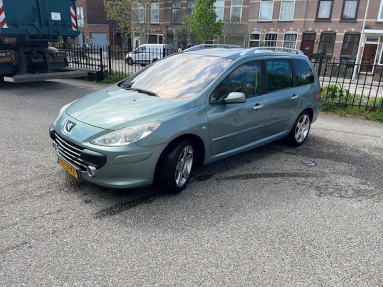 Peugeot 307 SW - 2.0-16V XSi! NW APK! 7 Persoons! Airco! Trek! - AutoWereld.nl