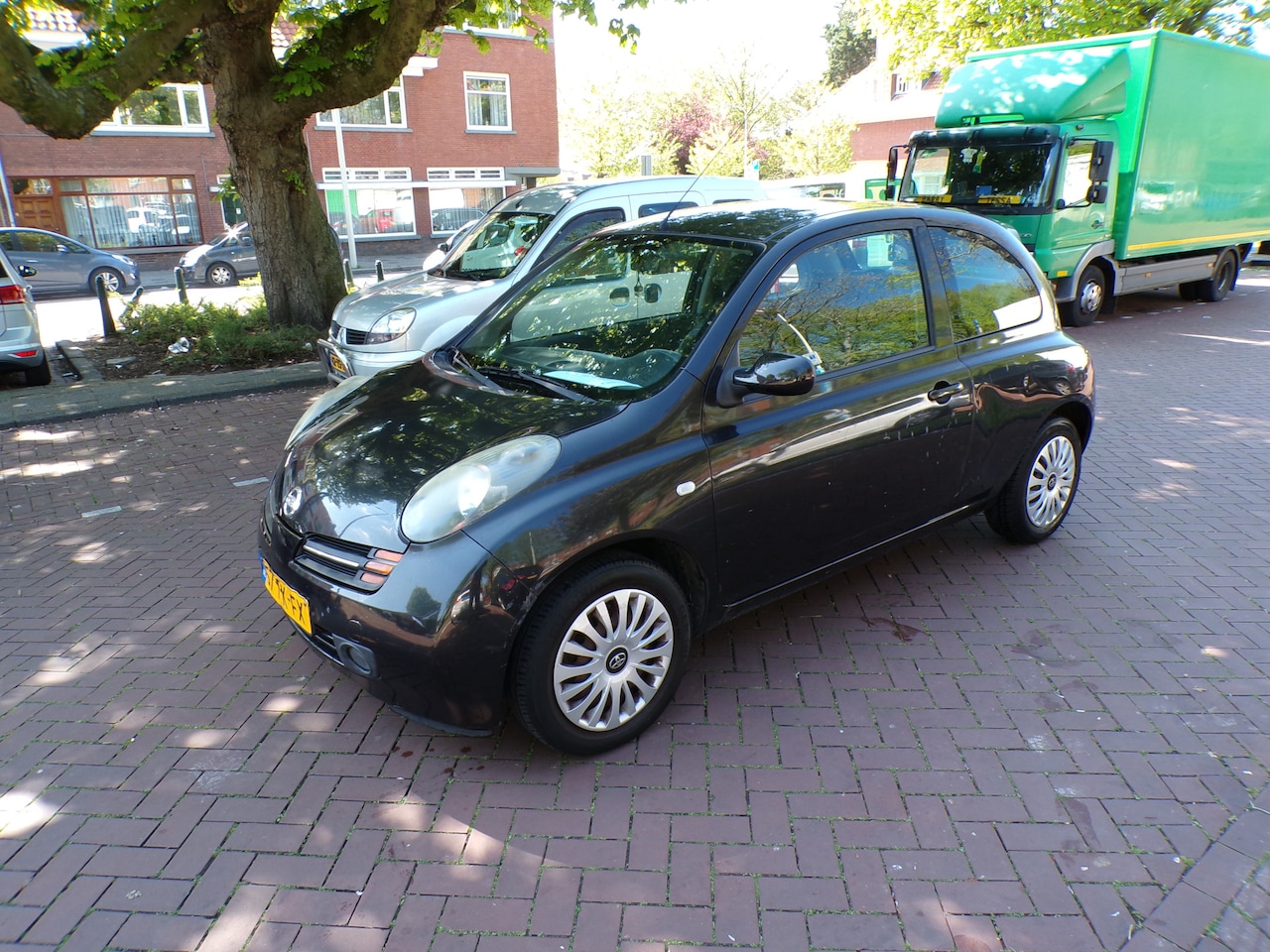 Nissan Micra - 1.2 Visia niet mooi ,rijdt wel goed,,, airco - AutoWereld.nl