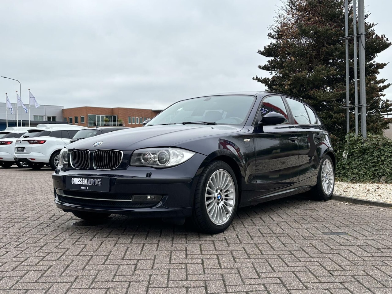 BMW 1-serie - 116i 116i, Xenon, Airco, Cruise, Trekhaak! - AutoWereld.nl