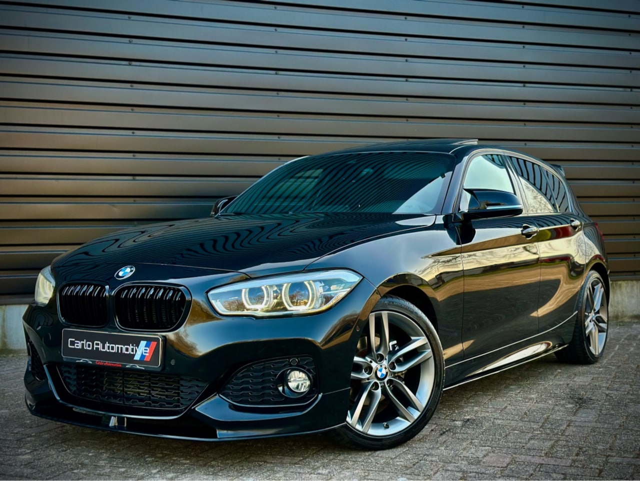 BMW 1-serie - 118i M-PERFORMANCE DAK|LEER|CAMERA|HiFi|SHADOW - AutoWereld.nl