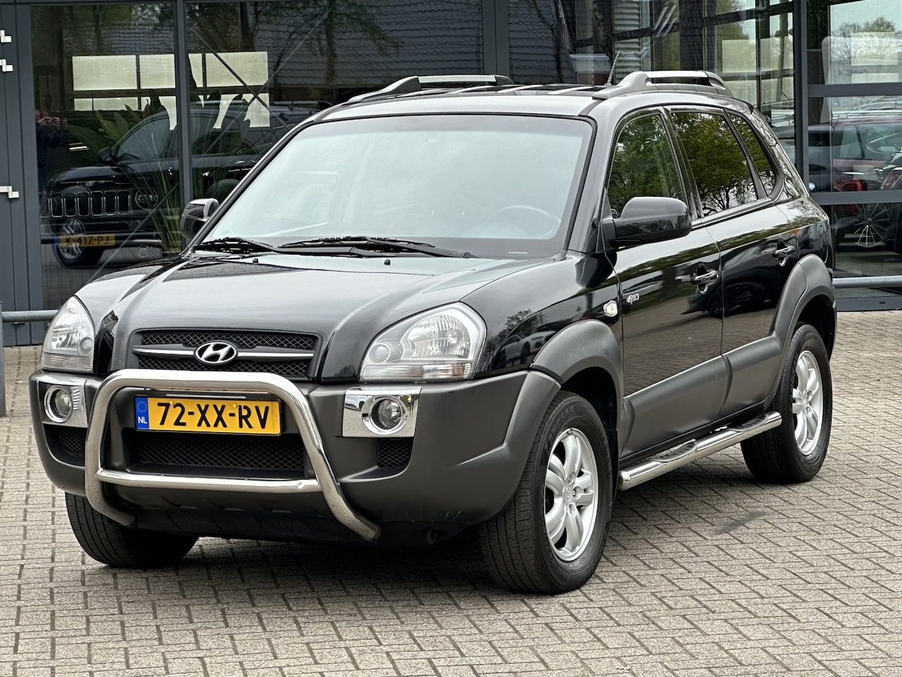 Hyundai Tucson - 2.7i V6 4WD StyleAutomaat/Airco/Cruise/Leder/Stoelverwarming - AutoWereld.nl
