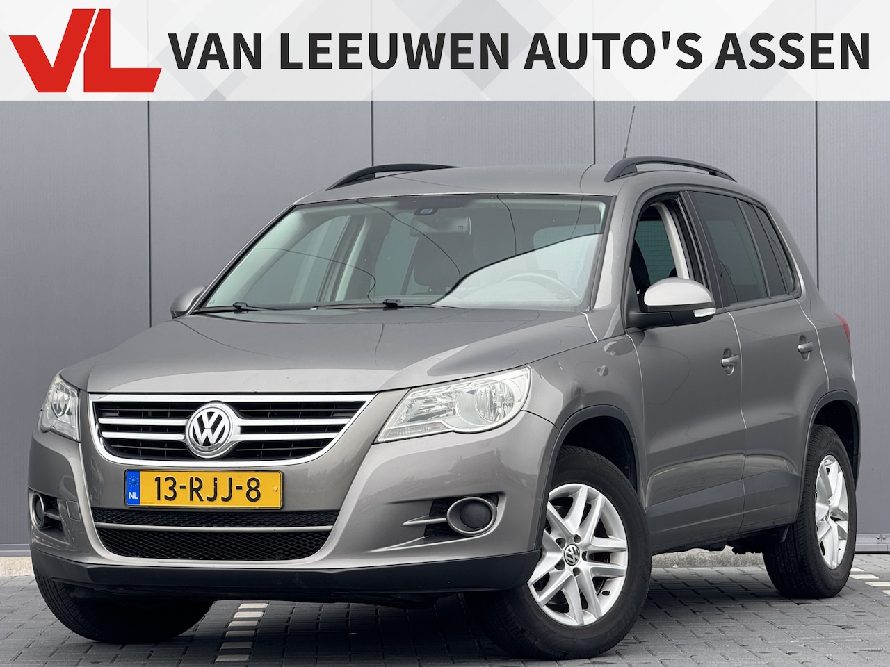 Volkswagen Tiguan - 1.4 TSI Comfort&Design | Cruise | Navi | Clima - AutoWereld.nl