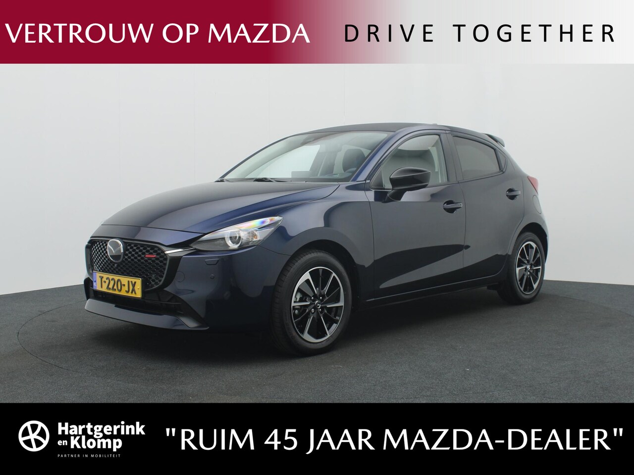 Mazda 2 - 1.5 e-SkyActiv-G Homura Aka met Driver Assistance pakket en dakspoiler : dealer onderhoude - AutoWereld.nl