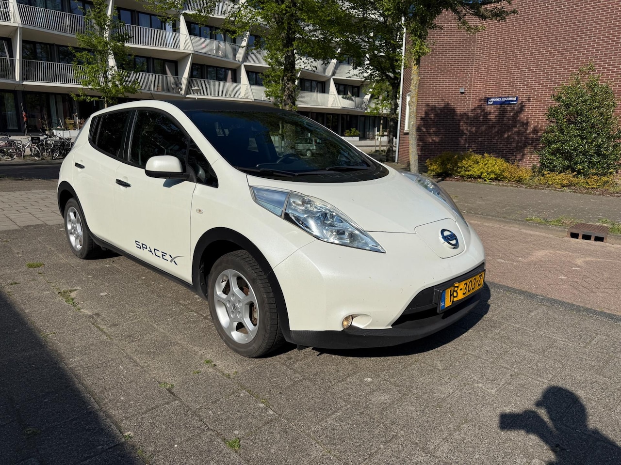 Nissan LEAF - Tekna 24 kWh Black Leather White Metallic - AutoWereld.nl