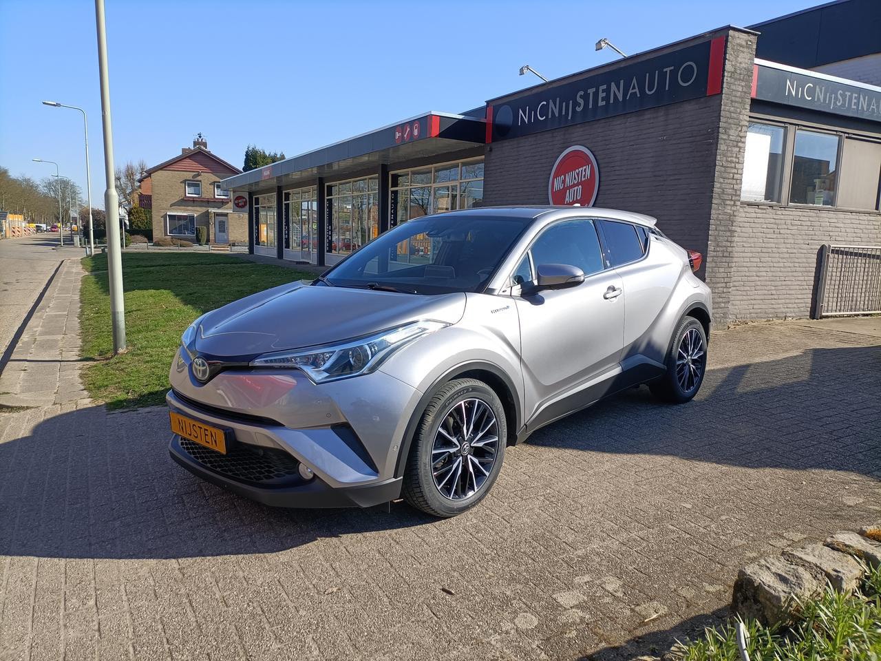 Toyota C-HR - 1.8 Hybrid, Navi, Cruise, Climate, Team D - AutoWereld.nl