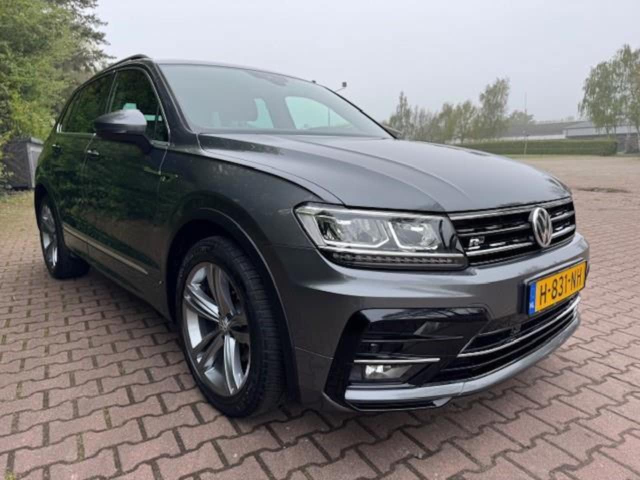 Volkswagen Tiguan - 1.5TSI 150PK DSG COMFORT R-LINE LED/NAVI/PDC/VIRTDASH - AutoWereld.nl