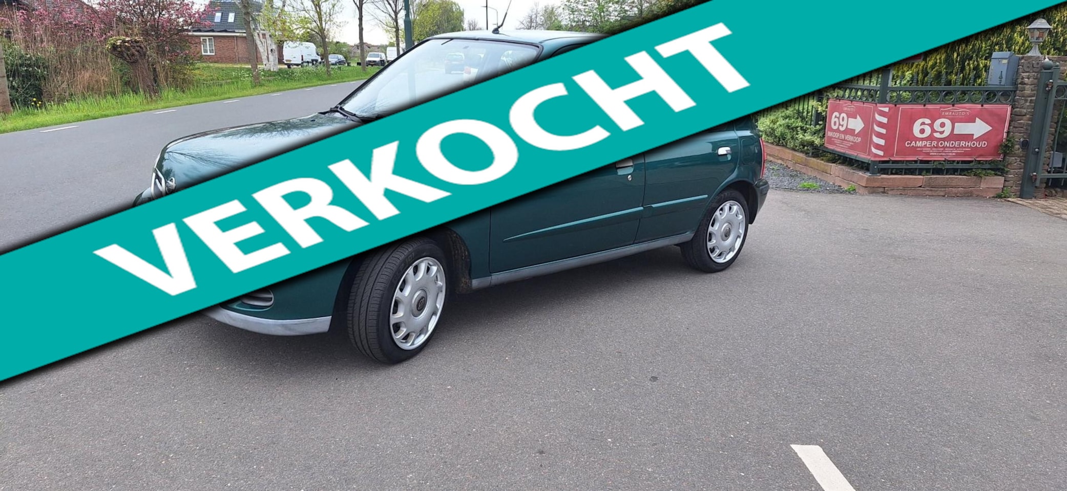 Nissan Micra - 1.4 Luxury CVT AUTOMAAT EN AIRCO - AutoWereld.nl