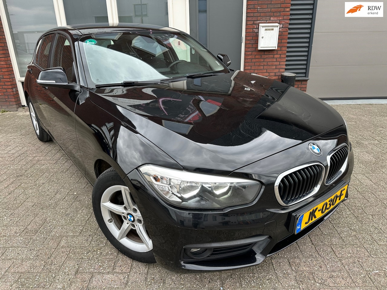 BMW 1-serie - 116i Sport / Navi / PDC / Clima / Cruise - AutoWereld.nl