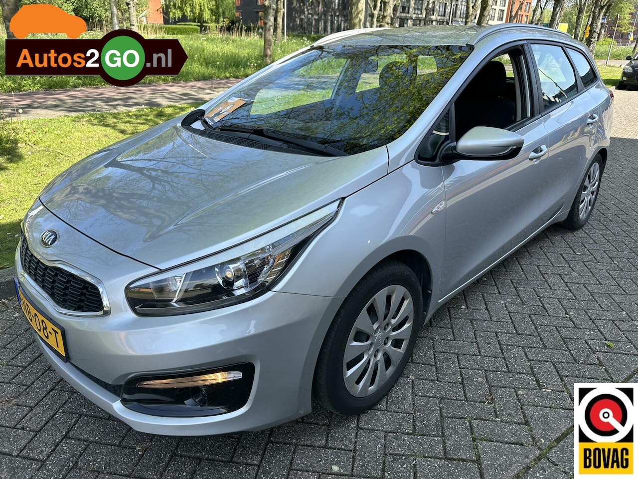 Kia Cee'd Sportswagon - 1.4i ComfortPlusLine Navigator I Navi I Cruise Controle I Camera I - AutoWereld.nl