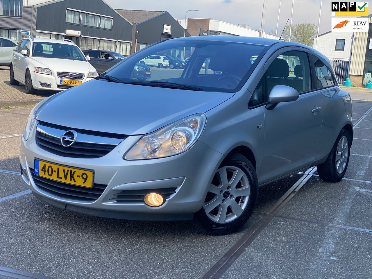 Opel Corsa - 1.4-16V Cosmo/ sport pakket/3drs/ nap/ 1jaar apk/ dealeronderhouden/ airco/ pdc/cruise con - AutoWereld.nl