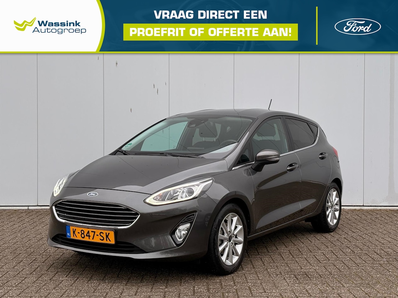 Ford Fiesta - 1.0 EcoBoost 100pk 5dr Titanium | Cruise | Navi by App | Sensoren | Lichtmetalen Velgen | - AutoWereld.nl
