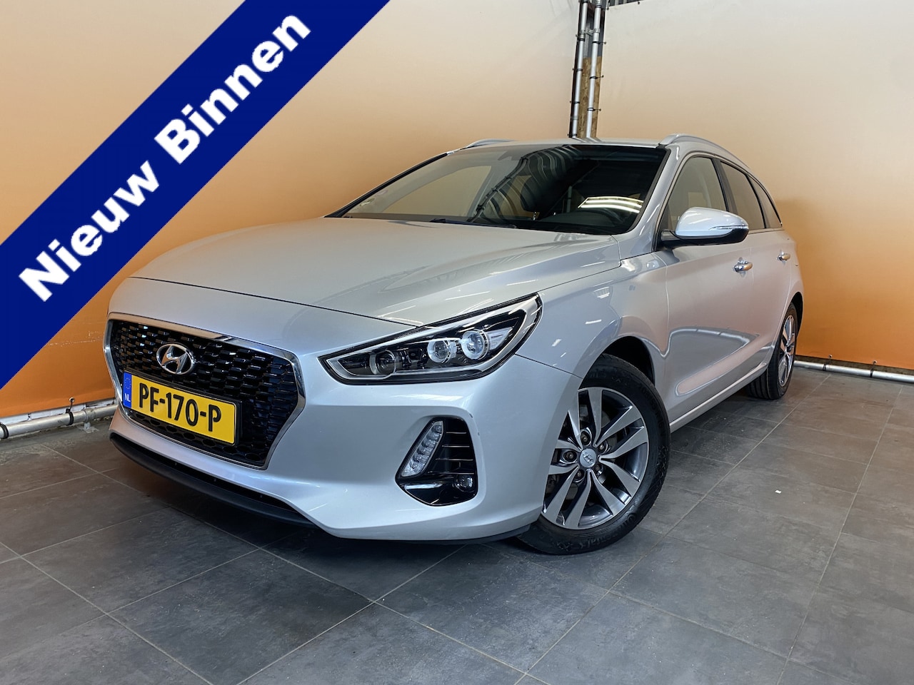 Hyundai i30 Wagon - 1.4 T-GDI Premium trekhaak | navi cruise control | metallic - AutoWereld.nl
