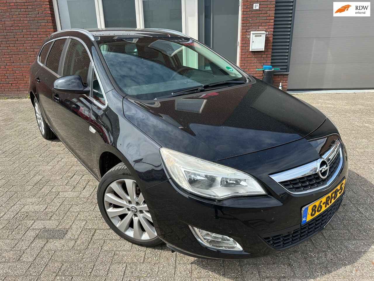 Opel Astra Sports Tourer - 1.4 Turbo Cosmo / Leder / Navi / PDC / Cruise / AUX - AutoWereld.nl