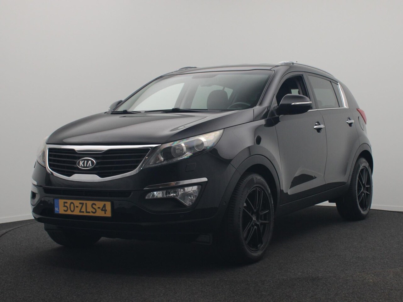 Kia Sportage - 1.6 GDI Super Pack Leder Stoelverwarming Voor/Achter Navigatie - AutoWereld.nl