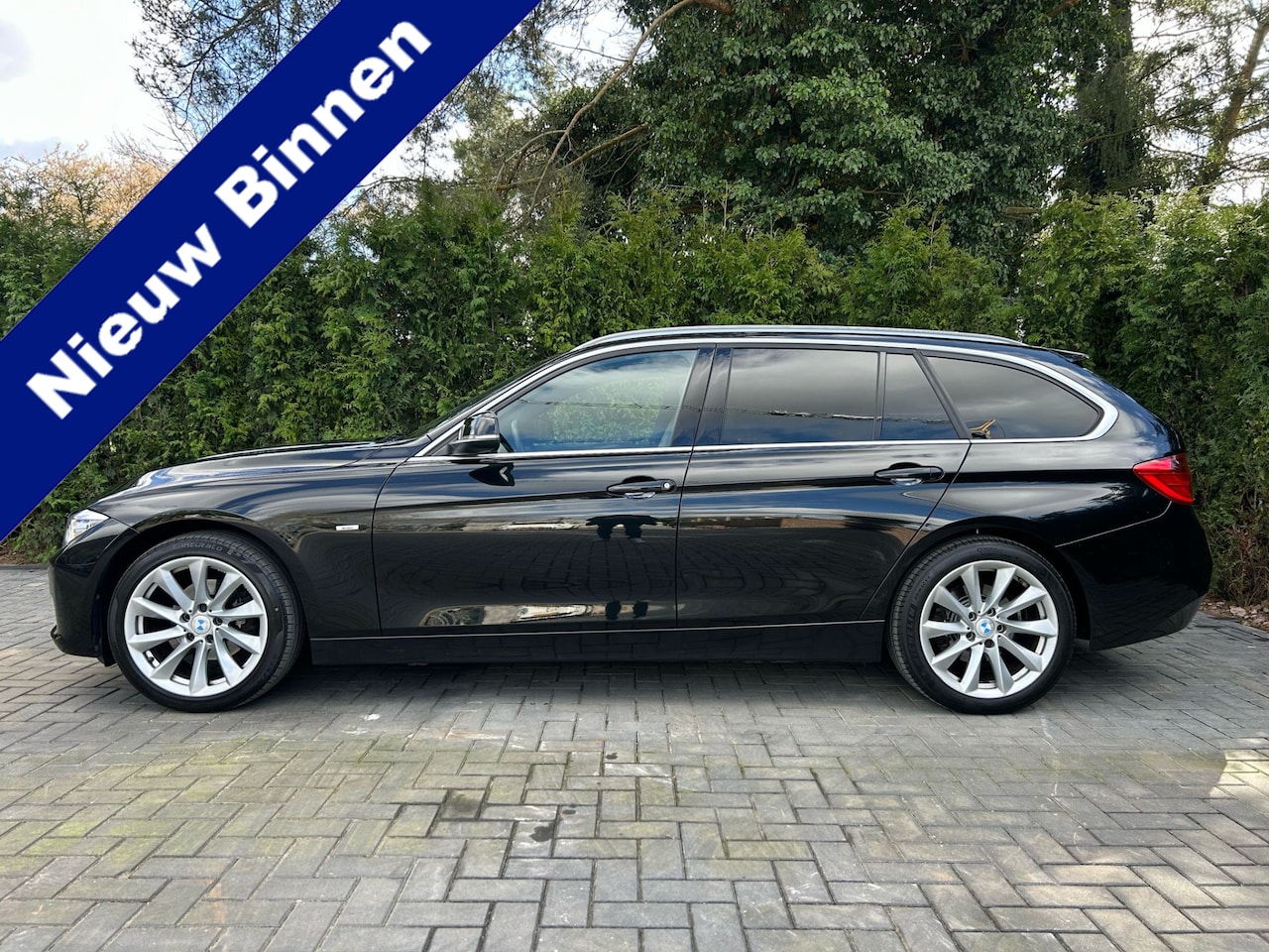 BMW 3-serie Touring - 320i High Executive Leder Stoelverwarming - AutoWereld.nl