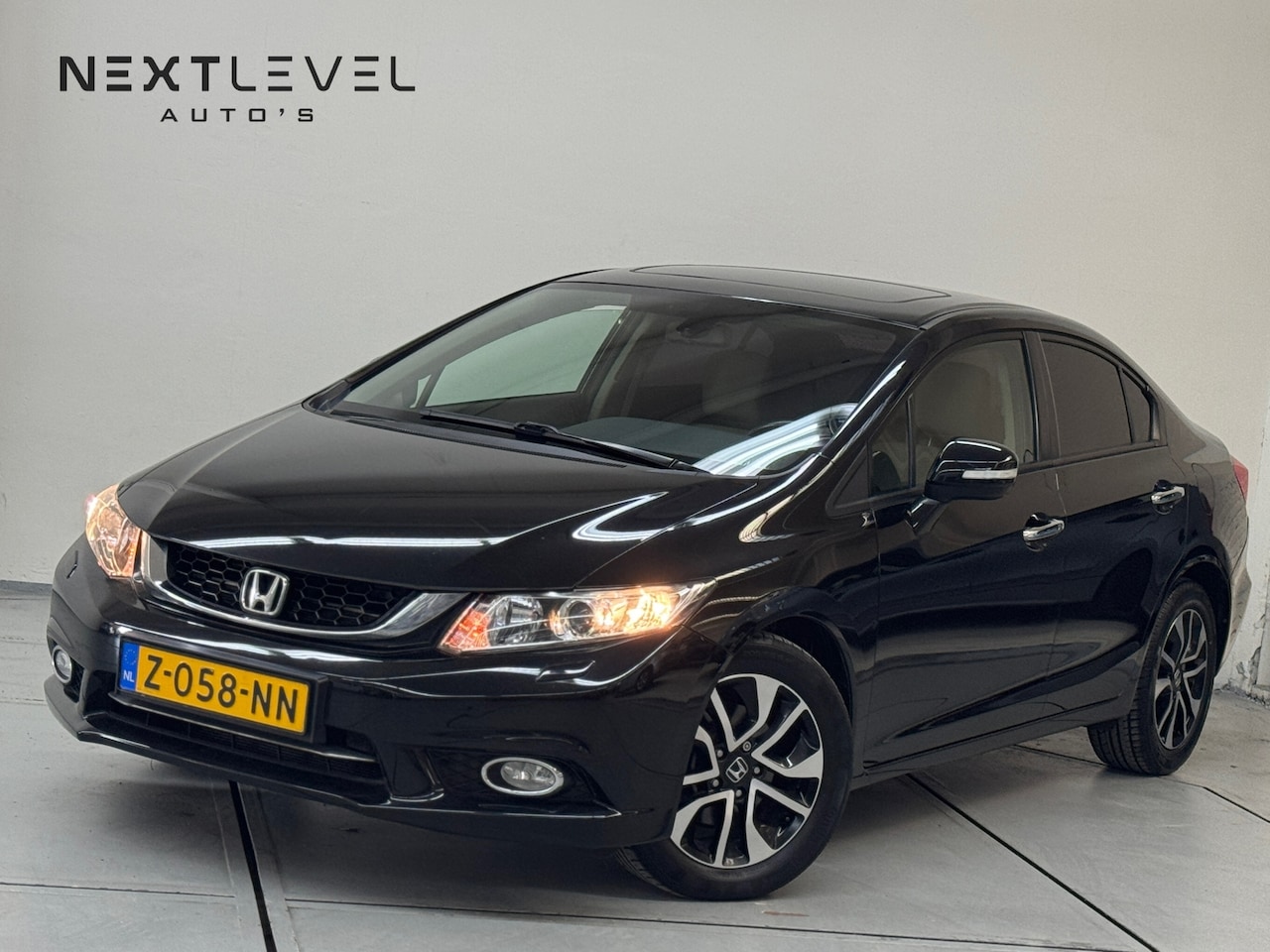 Honda Civic - 1.8 Elegance UNIEK AUTOMAAT VOL OPTIE DEAL OND. - AutoWereld.nl