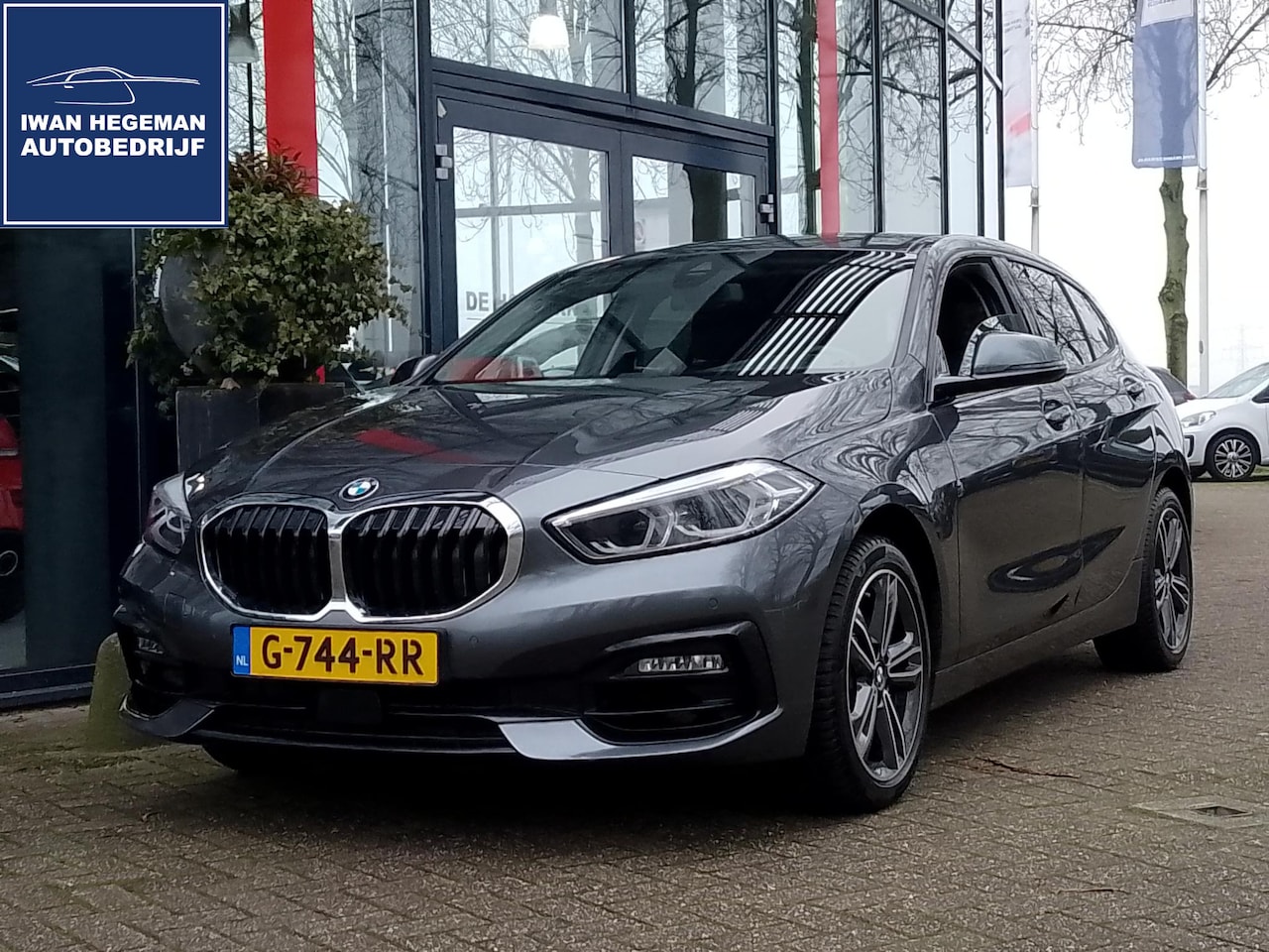 BMW 1-serie - 118i Executive Edition | Navigatie | ECC | PDC | Sportstoelen | Cruise Control BMW 1-serie - AutoWereld.nl