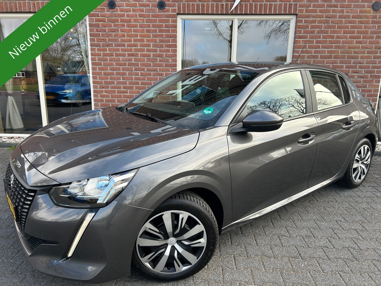 Peugeot 208 - 1.2 PureTech D-RIEM IS V.V. / CARPLAY / ANDROID / NAVI / AIRCO / CRUISE / LED - AutoWereld.nl