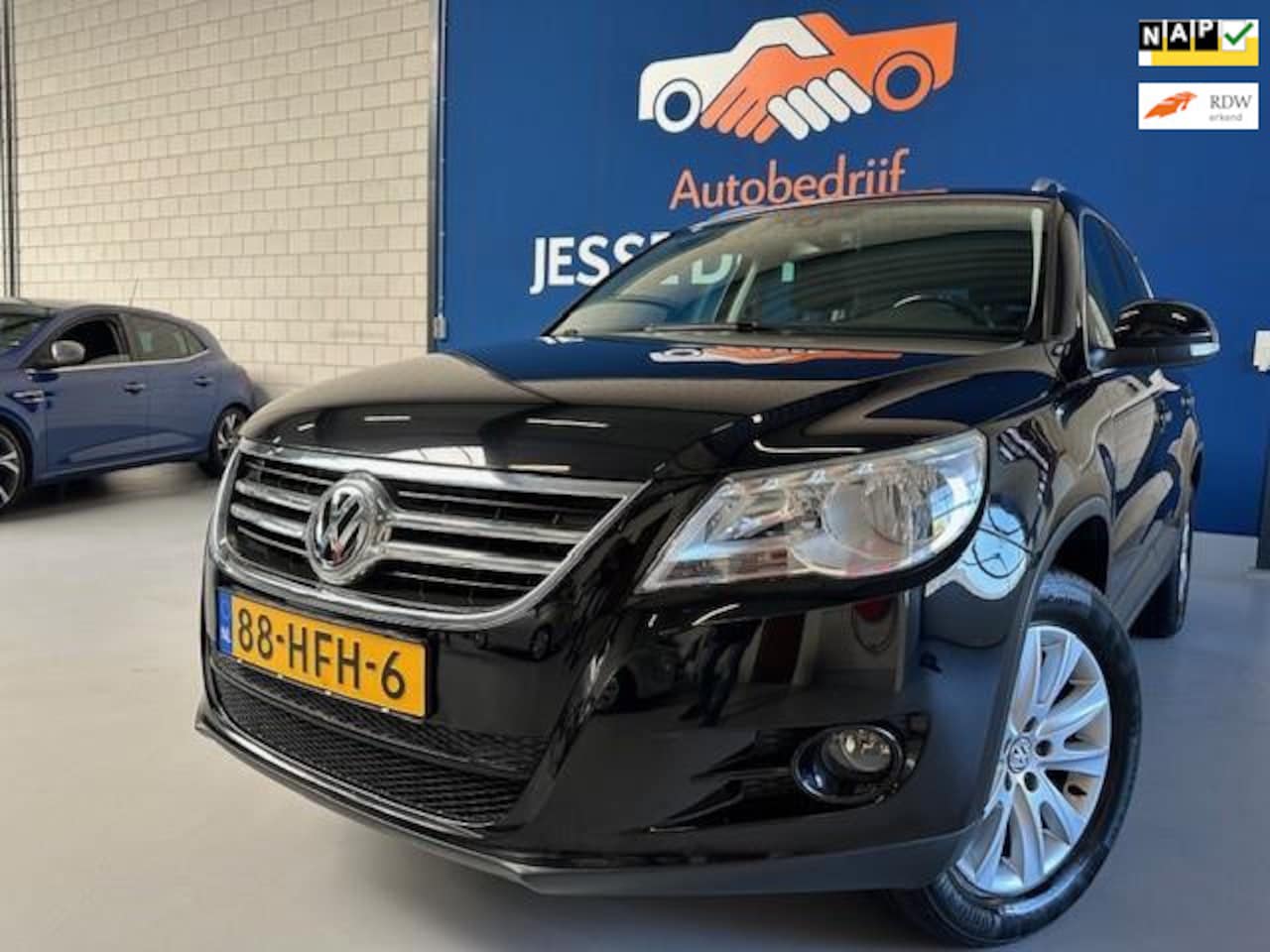 Volkswagen Tiguan - 1.4 TSI Sport&Style 4Motion,bj.2008 ! Kleur:Zwart !NAP met 134038 km.APK tot 02/2026,Clima - AutoWereld.nl