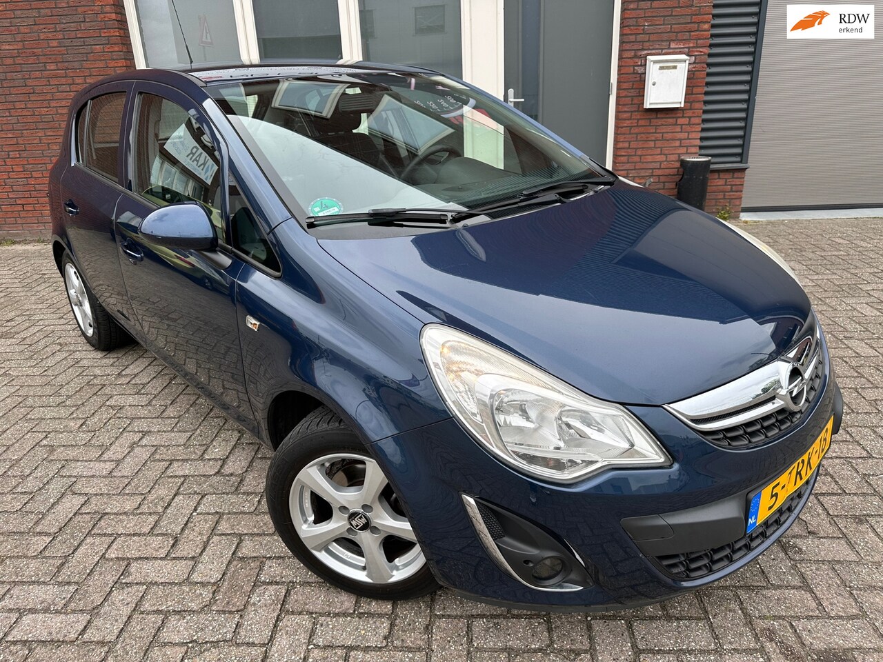 Opel Corsa - 1.2-16V Rhythm / Navi / Cruise / PDC / NAP - AutoWereld.nl
