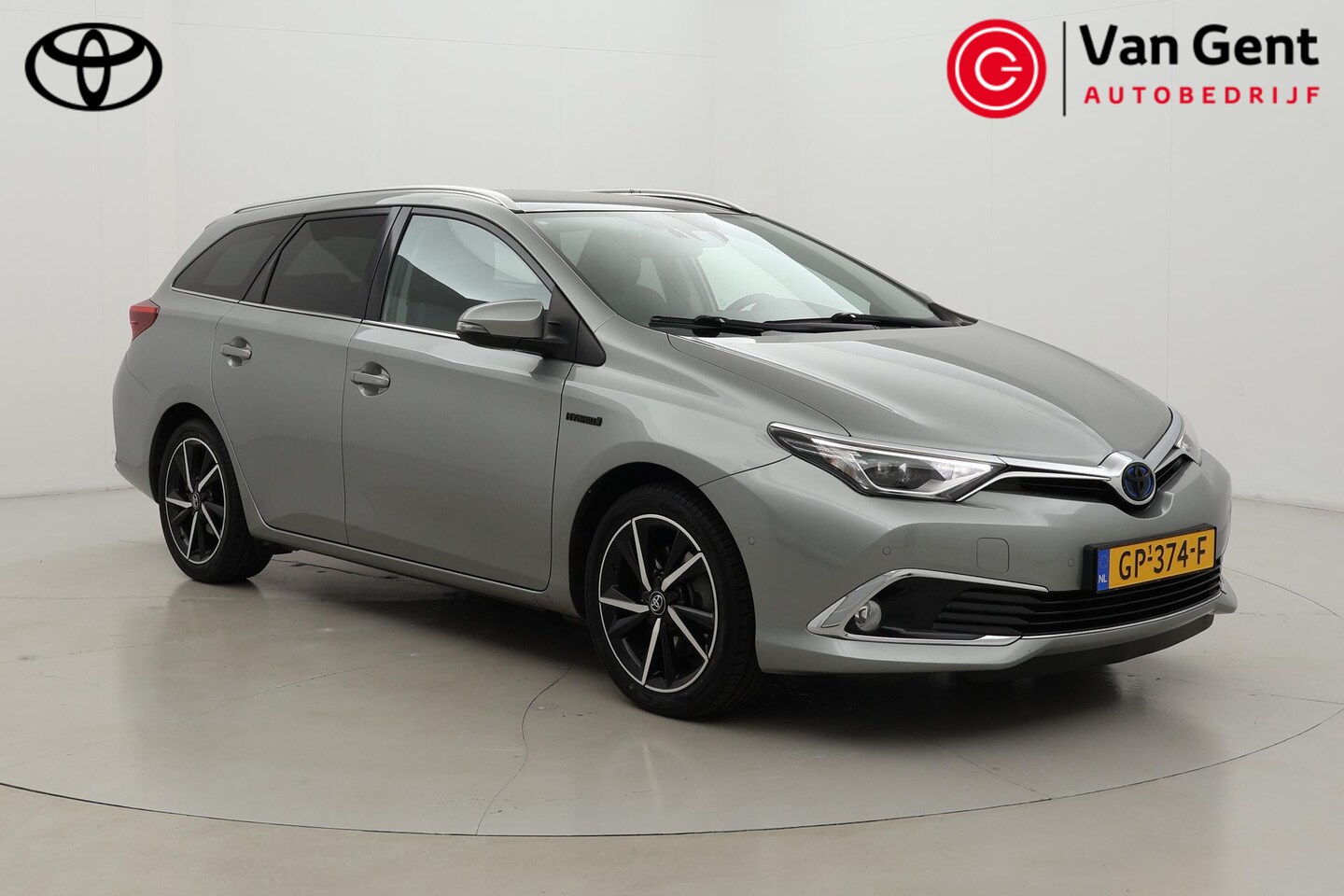 Toyota Auris Touring Sports - 1.8 Hybrid Lease pro | Panoramadak | Trekhaak | Navigatie | Stoelverwarming | Keyless | 17 - AutoWereld.nl